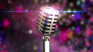 Download Retro microphone stage. Close up vintage microphone on stage. Old microphone on light background for free
