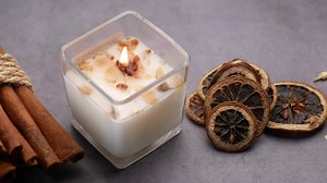 Burning scented candles for relax on black background