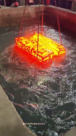 Witness the Intense Quenching Process of Glowing Hot Industrial Steel