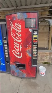 Checking used coke machine profit!