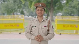 Happy Indian police officer clapping and appreciating