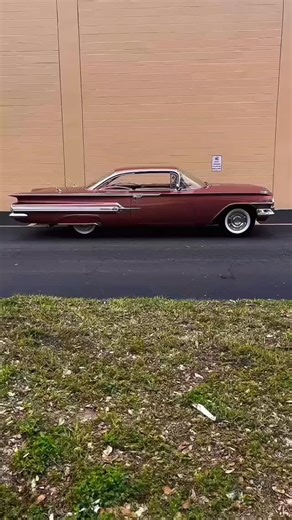 The 1960 Chevrolet Impala marked the second and final year of the first-generation redesign, showcasing a sleeker, more refined look compared to its 1959 predecessor. It retained the iconic "batwing" rear fins but toned them down into more sculpted and tasteful horizontal wings, complemented by triple taillights on each side—an Impala signature. The front end featured a wide, full grille and dual headlights, giving it a bold yet elegant presence. Available in several body styles, including a har