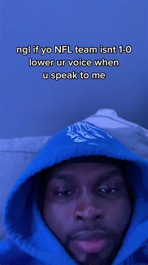 Humorous NFL Team Banter in Colorful Lighting