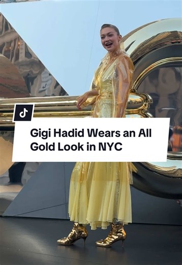 Gigi Hadid Stuns in Gold Latex Trench Coat in NYC