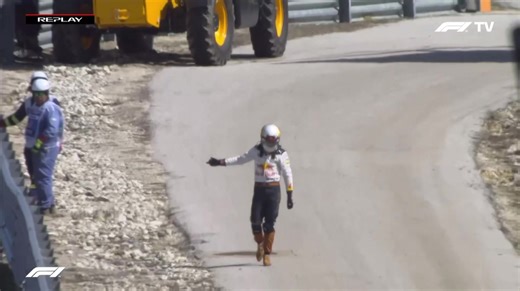 Daniel Ricciardo gives his Red Bull the finger after retiring with a power unit failure. (2018 United States Grand Prix)