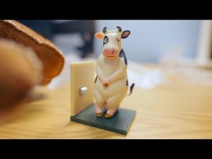 Cow on Toilet from SATO KUNIO's ANIMAL Bathroom Break