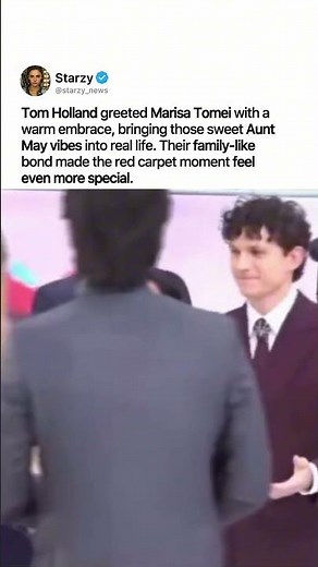 TOM HOLLAND WARMLY HUGS MARISA TOMEI