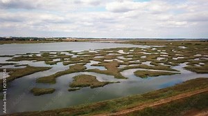 Aerial Drone footage of flooded Salt marsh. This salt marsh is at Mersea Island in the UK.