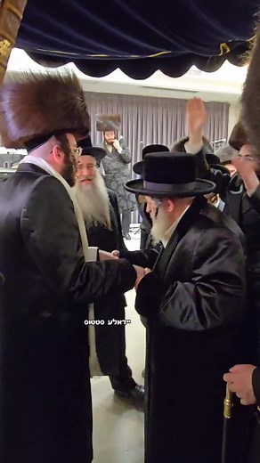 The Viznitz Rebbe Dancing with the Groom at a Joyful Jewish Wedding