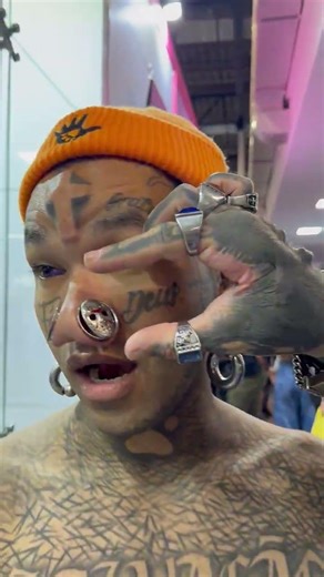 Heavily tattooed men showcase extreme body modifications in São Paulo, Brazil