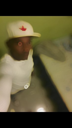 Selfie Session in a Cozy Bedroom Setting