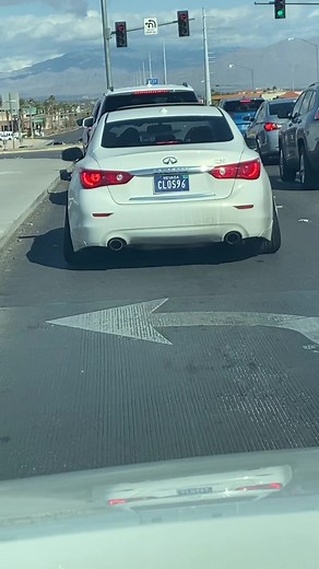Exciting Race Car Action: Infinity vs. Nissan on the Freeway