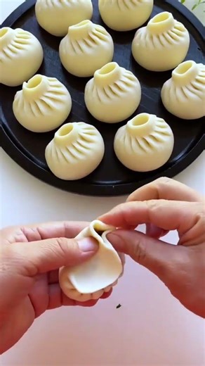 the process of forming a cake into a bucket shape before steaming #construction #popular #viralshort
