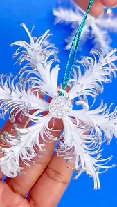 4.3K views · 175 reactions | My little 3D snowflake ❄️ This glittery paper snowflake is made using just paper and three toothpicks. The toothpicks help shape those soft feathery edges and give the snowflake its beautiful depth. #FBDecChallenge #snowflake #diychristmas | Craftish Corner | Facebook