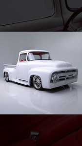 45K views · 991 reactions | Turning heads in white with a red interior! This custom 1956 Ford Motor Company F-100 pickup runs a 5.0-liter Gen 3 Coyote engine with a 10R80 automatic on a full TCI Engineering chassis, finished with Vintage Air and a leather cabin. Watch it cross the block with No Reserve during the 2026 Scottsdale Auction, Jan. 17-25. Learn more: bit.ly/SD26FB-1956FordF-100CustomPickup | Barrett-Jackson | Facebook