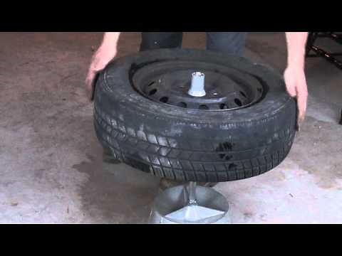 balancing a tire with a bubble balancer