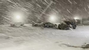 Snow coming down outside the KAMC studio earlier this evening | KAMC News