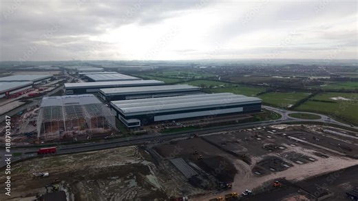Northampton, United Kingdom - 17 January 2026: Aerial view of the Royal Mail Midlands Super Hub showing construction and the large distribution warehouses.