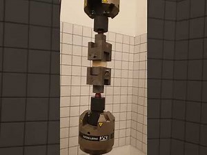 ASTM C297 tension test with INSTRON 8801