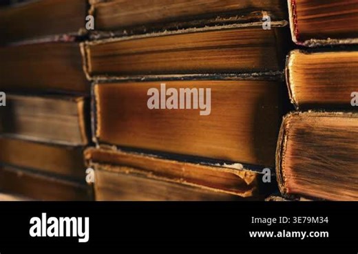 Library stacks of old books slider moves in antique store. Bookstore in vintage style. Literature, knowledge, information concept. High quality 4k footage Stock Video Footage - Alamy