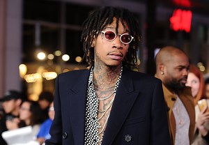 Wiz Khalifa Responds To Jokes About His Feet With Poem