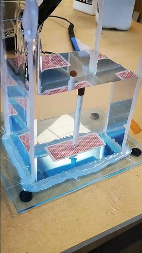 Slow Motion Bullet Piercing Through Playing Card