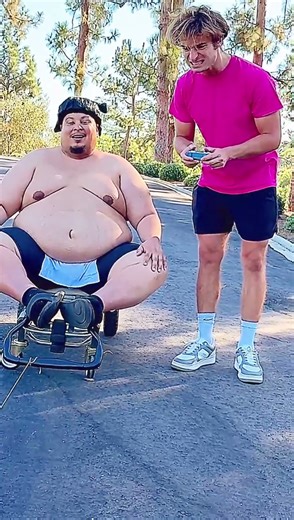 The Ultimate Remote-Controlled Car vs. Sumo Wrestler Showdown
