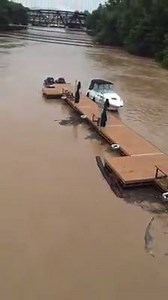 This was the scene this morning from the Spring Street Bridge as a boat dock with three boats attached floated down the river. Thanks to Gary C. Morris for the video. | WCHS Eyewitness News