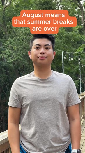 Summer breaks are over! Many children will return to school! Are you curious how US education system looks like? ⁠ ⁠ Image description: A young man with short black hair stands outdoors in front of green trees. He wears a light gray t-shirt and looks directly at the camera with a neutral expression. Text above his head reads, "August means that summer breaks are over." There are string lights in the background. #SummerBreak #USEductionSystem #Education #Schools #ASL #AmericanSignLanguage #Deaf #