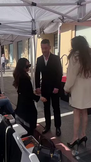#MacaulayCulkin and fiancée #BrendaSong share a kiss at his Hollywood Walk of Fame ceremony. | People