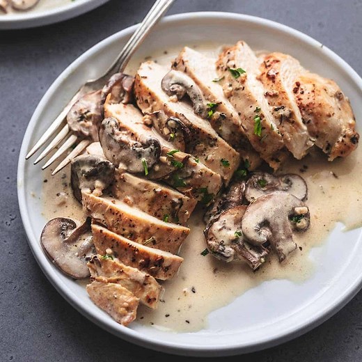 Chicken with Mushroom Cream Sauce- Easy, creamy mushroom sauce for chicken with rich, savory garlic and herb flavors made in just 15 minutes. You’ll be tempted to lick the plate clean when you serve this savory dish! RECIPE: https://www.lecremedelacrumb.com/chicken-mushroom-cream-sauce/ | Creme de la Crumb