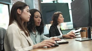 Team of Female Software Developers Collaborating on Code, Focused Programmers Working Together in Modern Office, Diverse Group of Women in Technology Industry, Professional Workspace Collaboration.