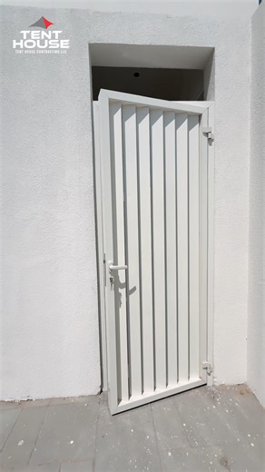 Elevate your property with this sleek, white, modern carport by Tent House Contracting LLC—a custom-designed solution that blends durable, weather-resistant function with sophisticated style. #TentHouseUAE #ModernPergola #CarportDesign #WhiteShade #OutdoorUpgrade #ExteriorGoals #UAEContracting #DubaiDesign #AbuDhabi #ParkingSolution #CustomShade #SleekDesign | Tent House ELectrical Contracting Llc