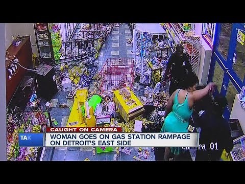 Woman trashes fas station