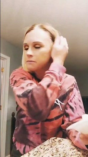 Blonde lady pies herself in the face