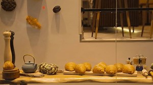 clip-3535998563-close-up-view-bakery-display-window-showcasing-assortment