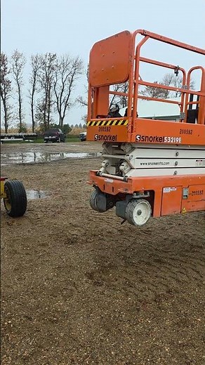easy way to move a scissor lift