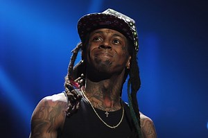 Lil Wayne Charged With Possession Of A Firearm   Facing Ten Years