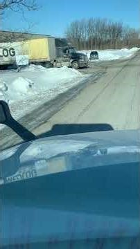 “Tractor trailer backing in off side street (cab view).”