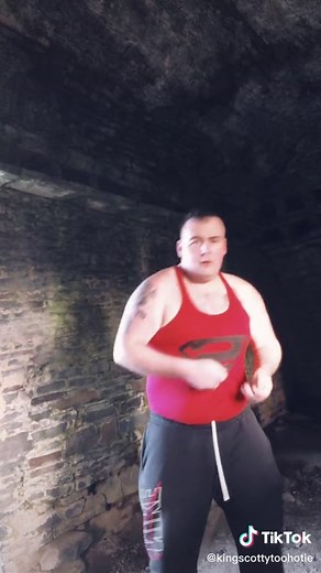 Boxing Workout Featuring Muscular Male in Red Top