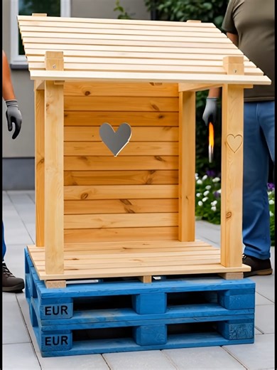 Pallet Heart-Shaped Garden Gazebo with Seating / DIY Garden Arbour on Pallet Base Decorative Cutouts: The back panel and side posts feature heart-shaped cutouts, a popular motif for adding rustic charm to handmade garden furniture. Repurposed Materials: The design emphasizes
