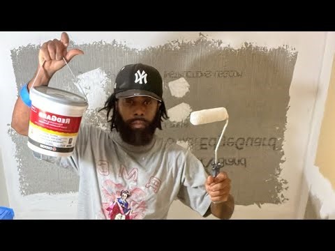 Applying a red guard and plastering framing to work at the end