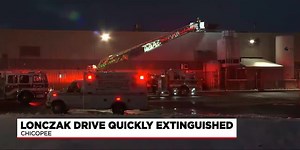 First responders put out factory fire