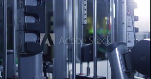 Man workout with power simulator in the gym