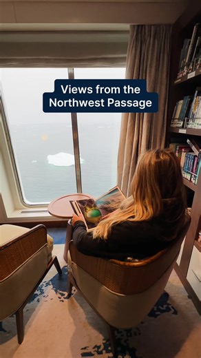 Slow mornings, endless views. Find your quiet corner in the library or watch the world drift by through panoramic windows. 📸 @navigateourlives #ExpeditionCruise #LifeAtSea #OceanViews #CruiseLife #GregMortimer