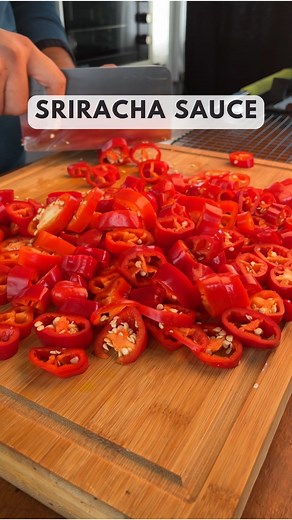 Crafians by Mudrit and Harsheen on Instagram: "MAKE SRIRACHA SAUCE AT HOME 🌶️ This is a Lacto Fermented Hot Sauce Recipe. Here, we ferment the red chilli peppers in salted water for 5-7 days after which we blend it with flavourings of choice to make this beautifully smooth and spicy Sriracha Sauce. Check pinned comment for recipe instructions #sriracha #srirachasauce #hotsauce #redchilli #condiments #sauces #recipes #recipevideo #fermentation"