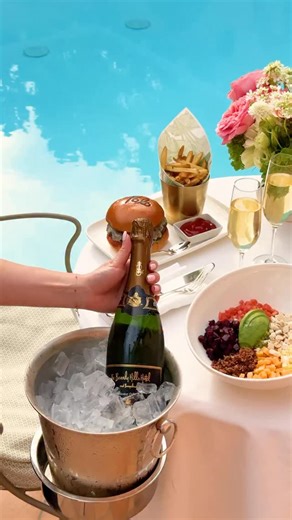 Bungalow dining, where champagne is always on the menu. 🥂 | The Beverly Hills Hotel