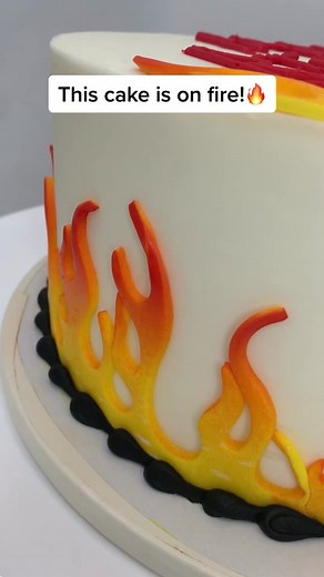 only the toughest and the baddest get this cake! 😎🔥 ##caketok##fire##frostingtechnique##fondanttutorial##cool##trending##cakeart##birthday##fyp##viralvideo