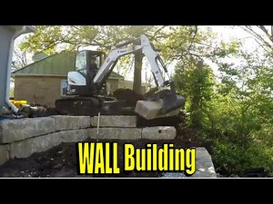 Building Stone Boulder Retaining Wall with Bobcat E35