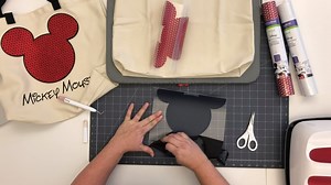 Join us LIVE as we create a fun and functional tote bag using our Cricut Everyday Iron on and our Cricut Glitter Iron-on Mesh Mickey in Red! | Cricut